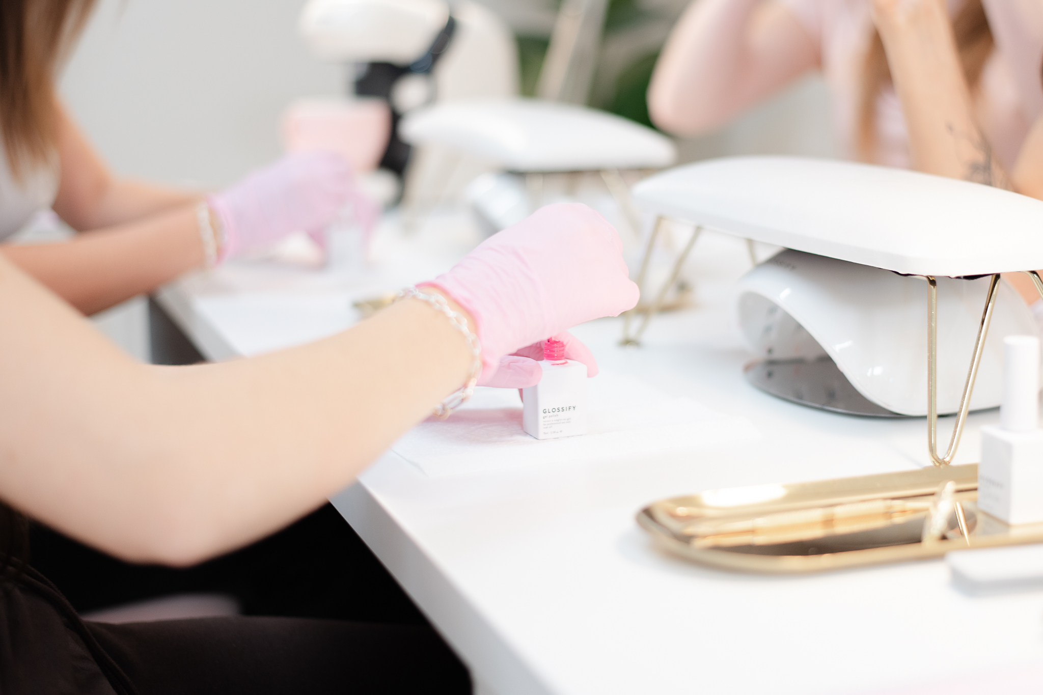 Training client using Bright Pink Builder Gel